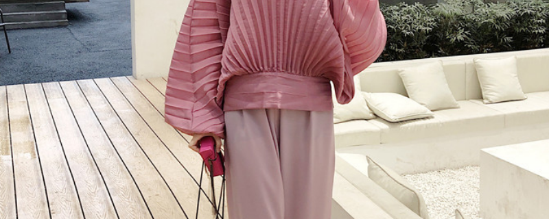 穿着裤子晒太阳会变黑吗_穿黑色衣服会晒黑吗